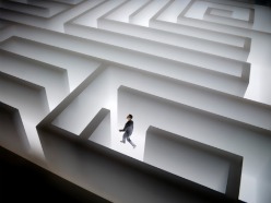 woman in a maze with a clear path