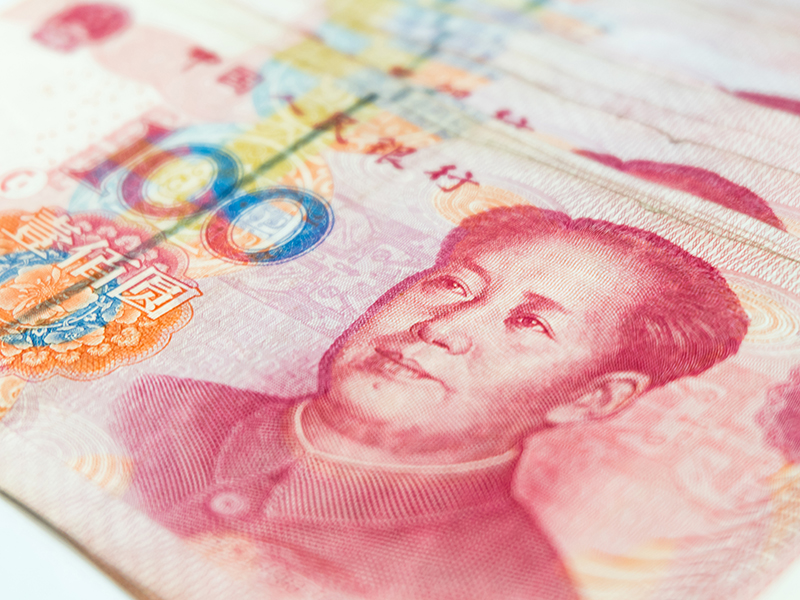 Closeup Chinese yuan banknotes, China's currency.