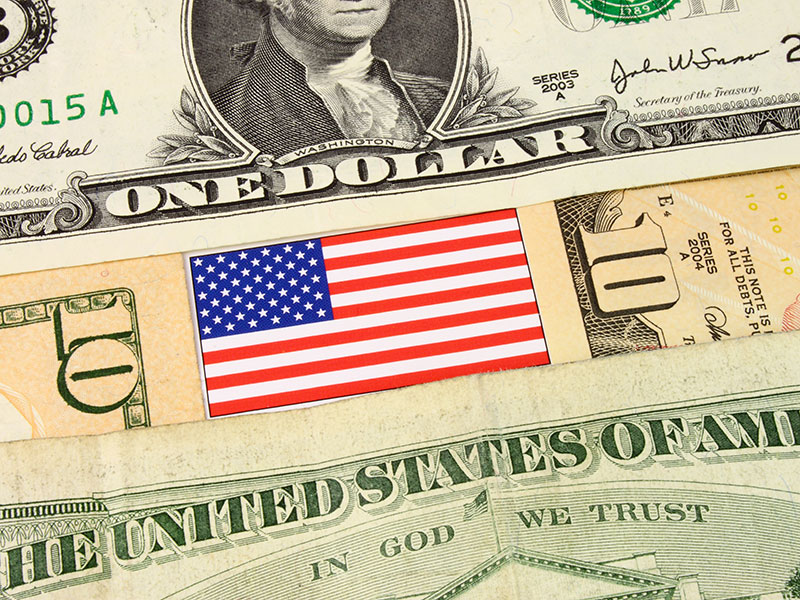 American flag and monetary bills