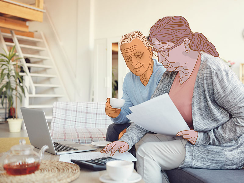 senior couple analyzing home finances