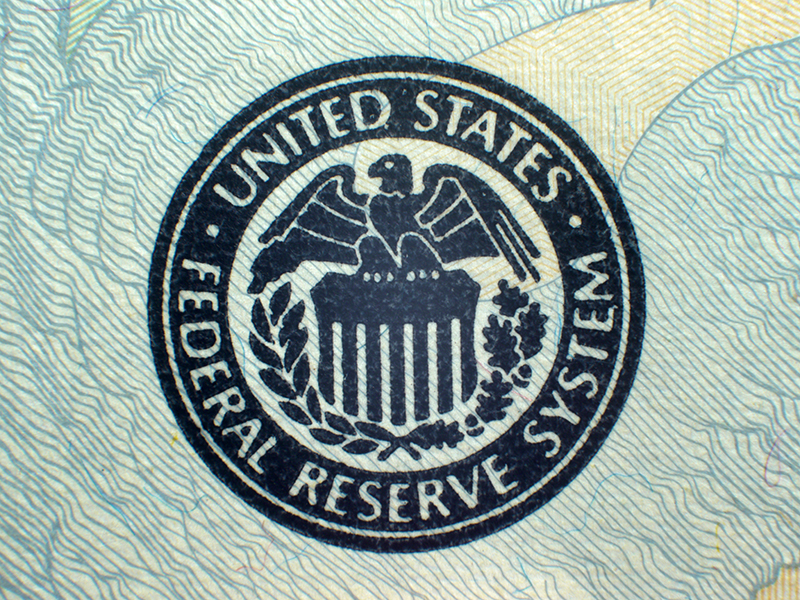 Macro close-up of Federal Reserve logo on USA Federal Reserve Note