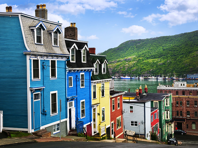 Street with colorful houses near ocean in St. John’s, Newfoundland, Canada