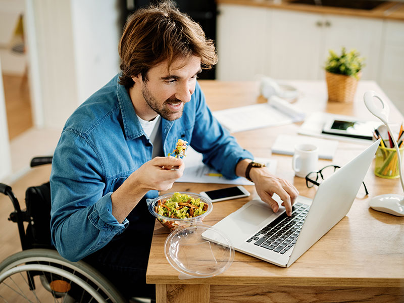 young man in wheelchair on a Zoom call