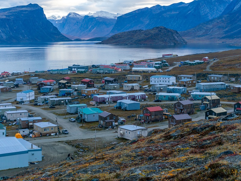 View of a remote Inuit community of Pangnirtung, Nunavut, Canada. Early morning before sunrise in Pangnirtung fjord.