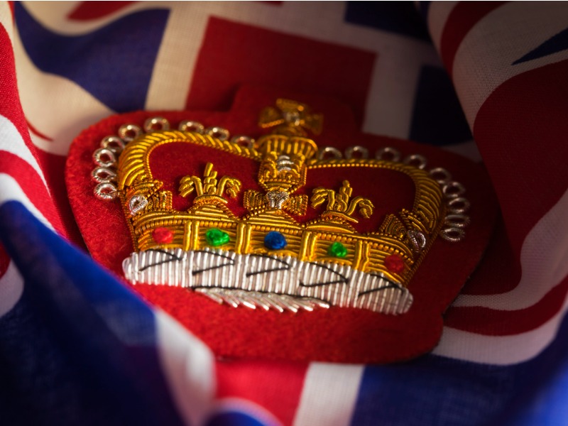 Embroidered Queens Crown Badge and Union Jack stock photo