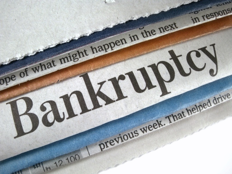 Newspaper headline "Bankruptcy"