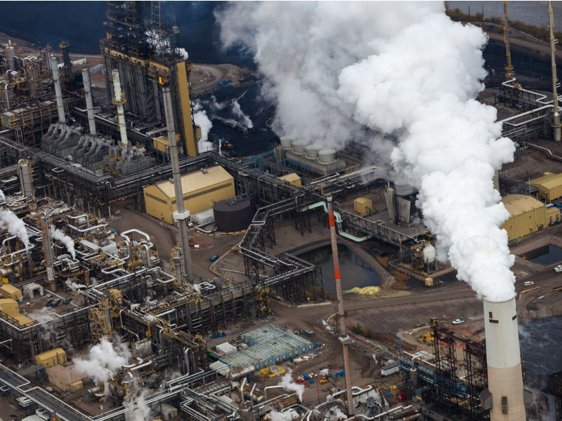 Close-up aerial photo of an oil refinery in the Alberta Oilsands, near Fort McMurray