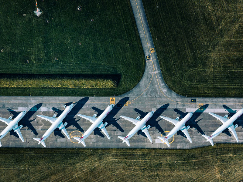 A long line of parked airplanes|sources-of-global-ghg-emissions-footnote-1|Key dimensions in corporate net-zero targets