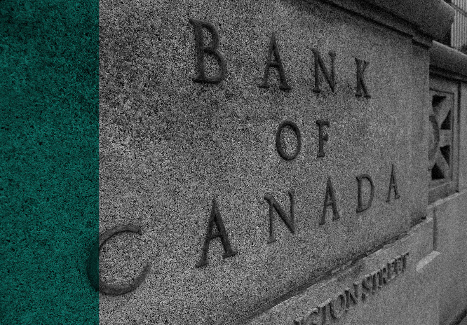 Sign Bank of Canada on the Canadian bank's granite facade.